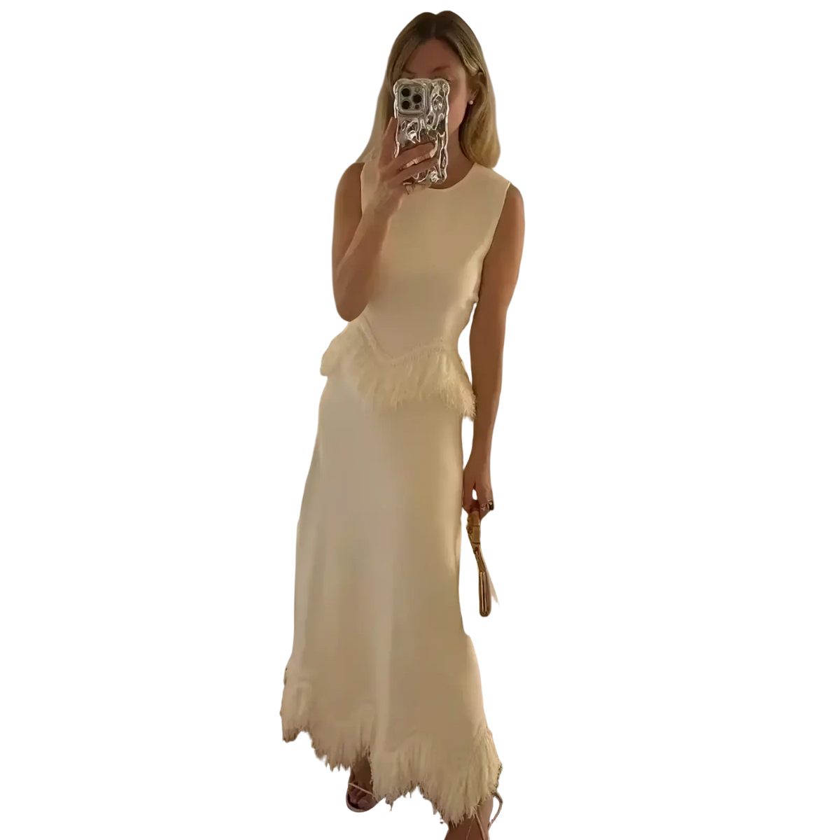 Off-white sleeveless two-piece maxi dress set with fitted bodice and feather trim hemline