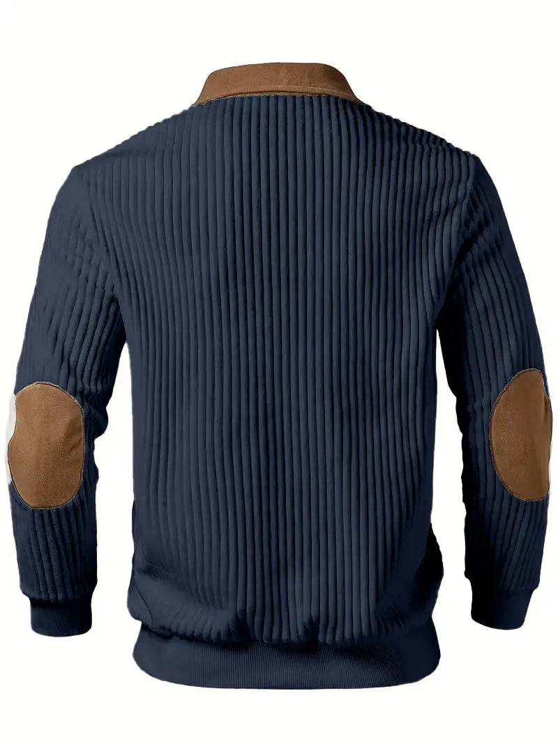 Navy blue ribbed corduroy men’s jacket with tan leather elbow and collar patches for a stylish half zip knit sweater look.