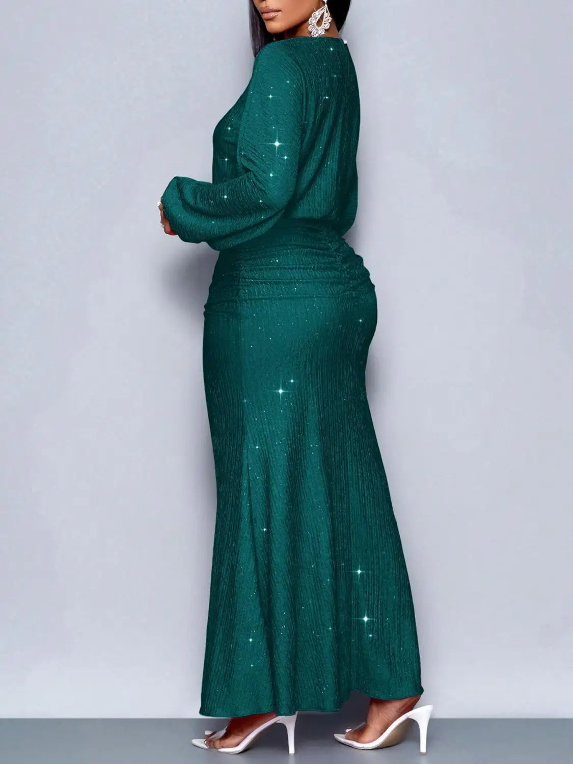 Emerald green sequin lantern sleeve mermaid two piece set featuring a fitted waist and long sleeves.