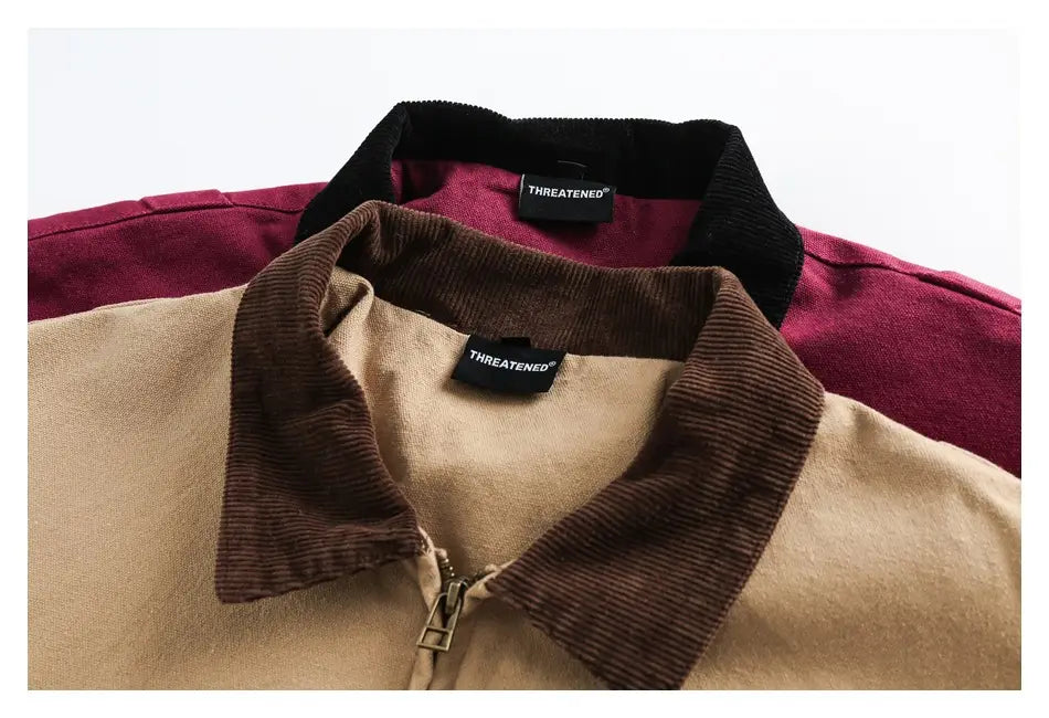 Retro washed Detroit jacket men featuring a tan corduroy collar with black inner lining and threatened brand label.
