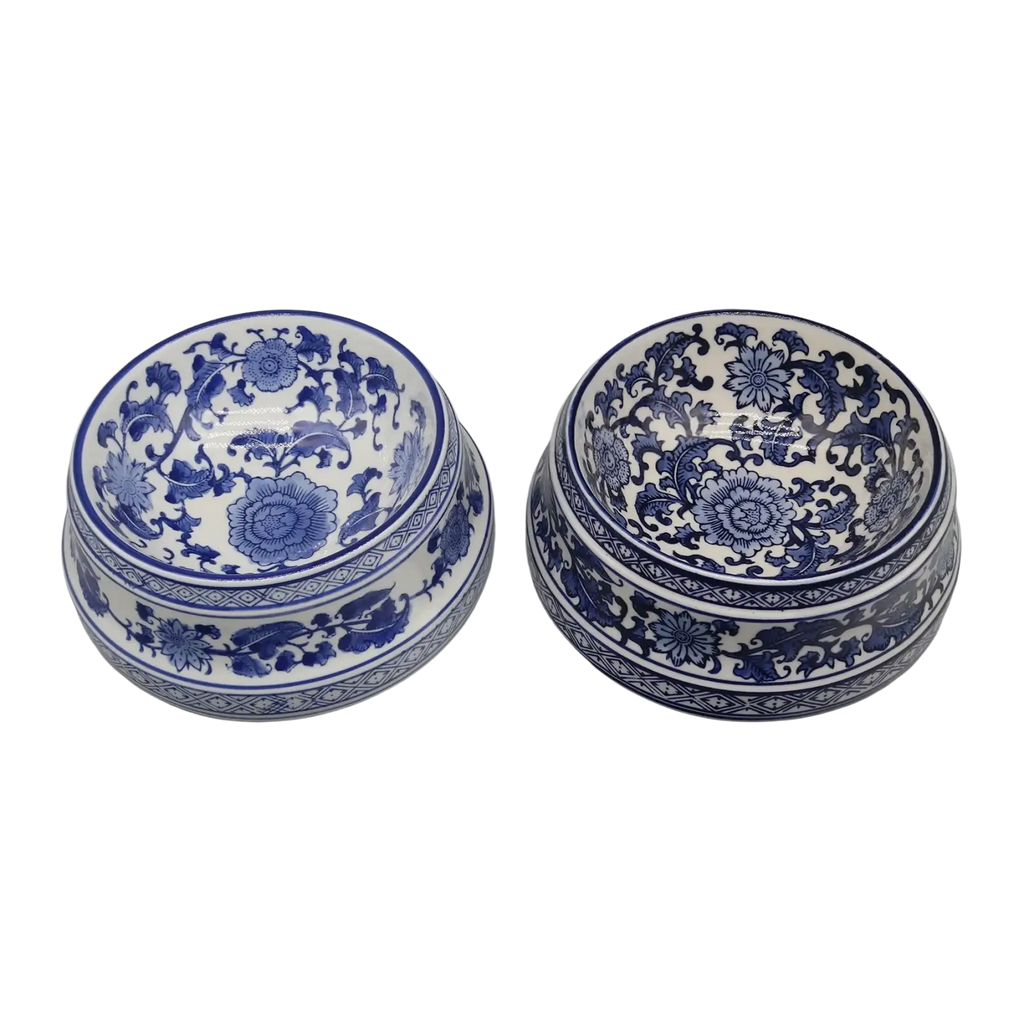 Two blue and white feeding bowl ceramic set with intricate floral patterns and detailed borders in porcelain material