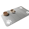 Gray herringbone-patterned waterproof rubber feeding mat with white paw prints for dog and cat food bowls