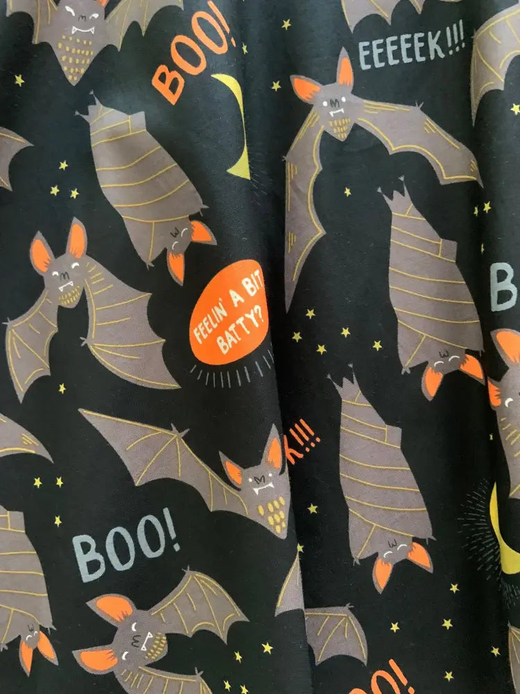 Black plus size 1x skater skirt with halloween gray bats orange accents and phrases feeling batty on fabric