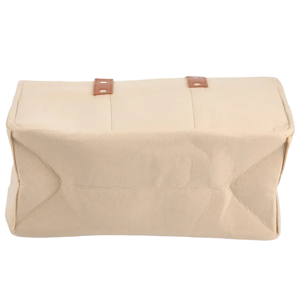 Beige felt baby diaper caddy nursery storage basket with two brown leather straps made of canvas material