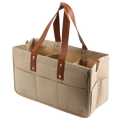Beige canvas felt baby diaper caddy with brown leather handles and silver rivets for nursery storage organization