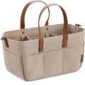 Beige felt diaper caddy nursery organizer basket with brown leather handles and stitching made of canvas material