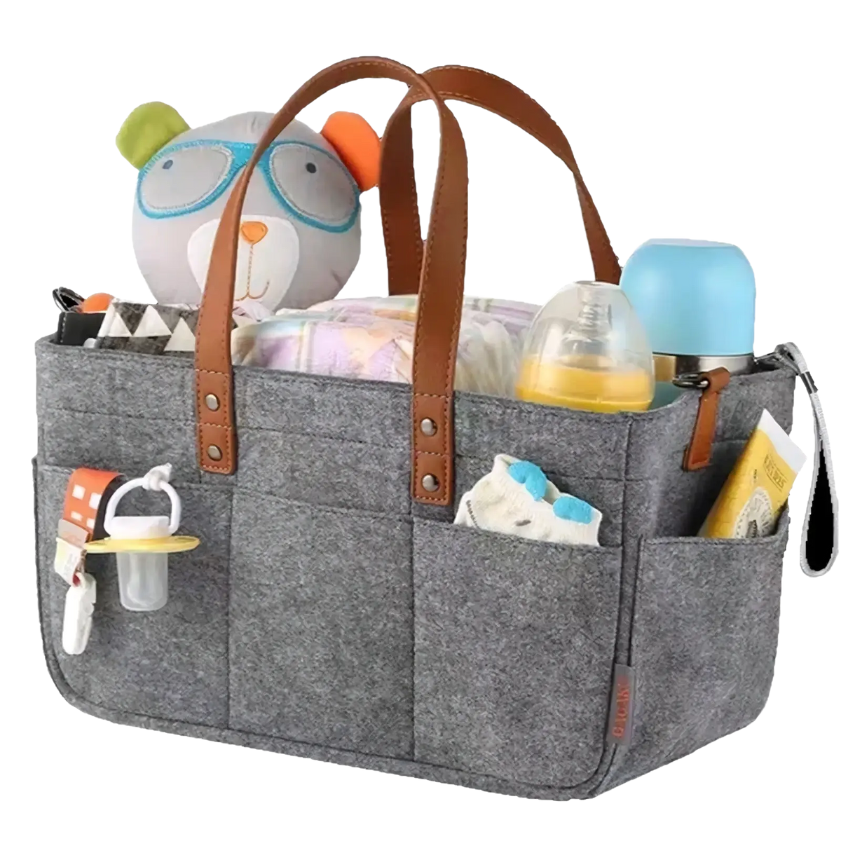 Gray felt diaper caddy nursery organizer basket with brown leather handles filled with diapers bottles and a plush toy