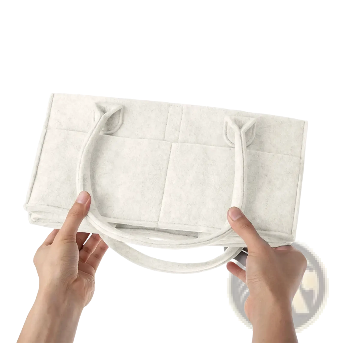 Off-white felt diaper caddy nursery storage basket with soft padded handles and collapsible design for easy storage