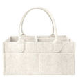 Off-white felt diaper caddy nursery storage basket tote with two rounded handles and multiple compartments