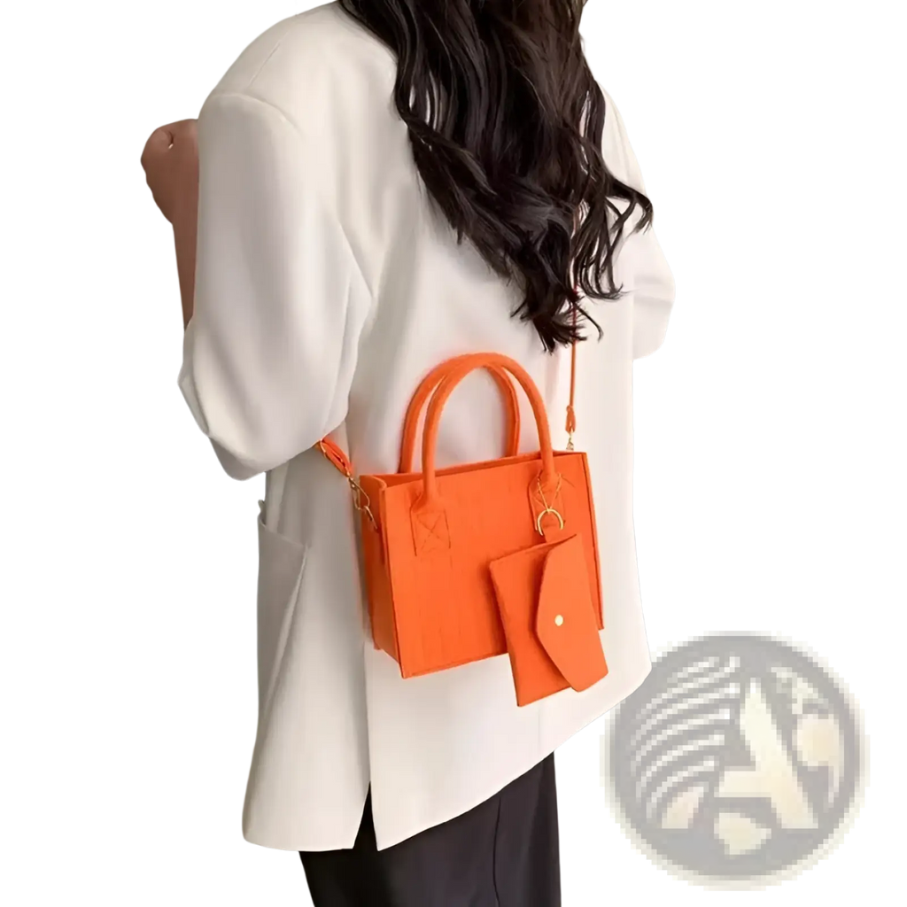 Bright orange felt handbag set with mini tote, matching detachable wallet, strap, and gold tone hardware