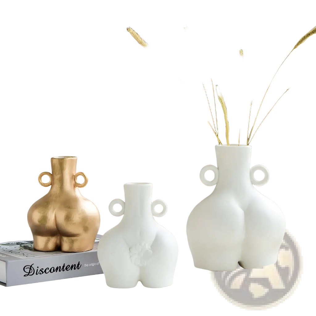 White ceramic female body vase shaped like buttocks with circular handles on either side