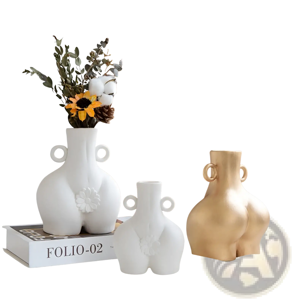 White and gold ceramic female body vase with buttocks design, circular handles, and floral embellishments