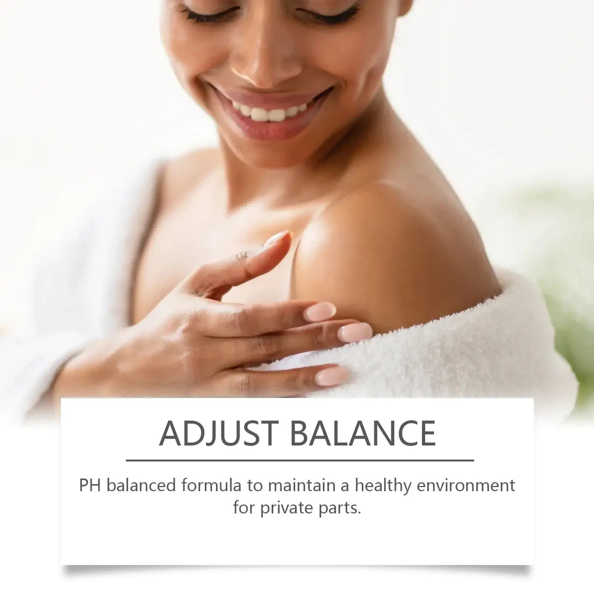 Woman with white towel wrapped around shoulders holding feminine wash gel ph balanced 100ml for balanced long lasting freshness