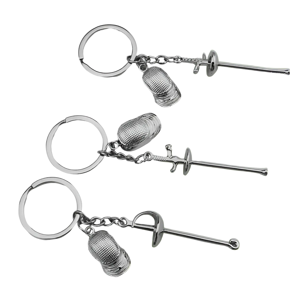 Silver metallic fencing keychain featuring detailed sword and glove charms made of metal for sports jewelry use