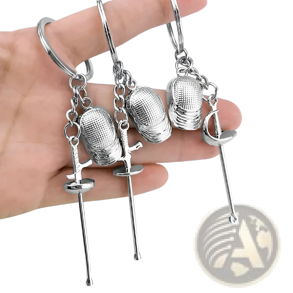 Silver metallic fencing keychains made of metal featuring detailed masks swords and gloves for sports sword jewelry
