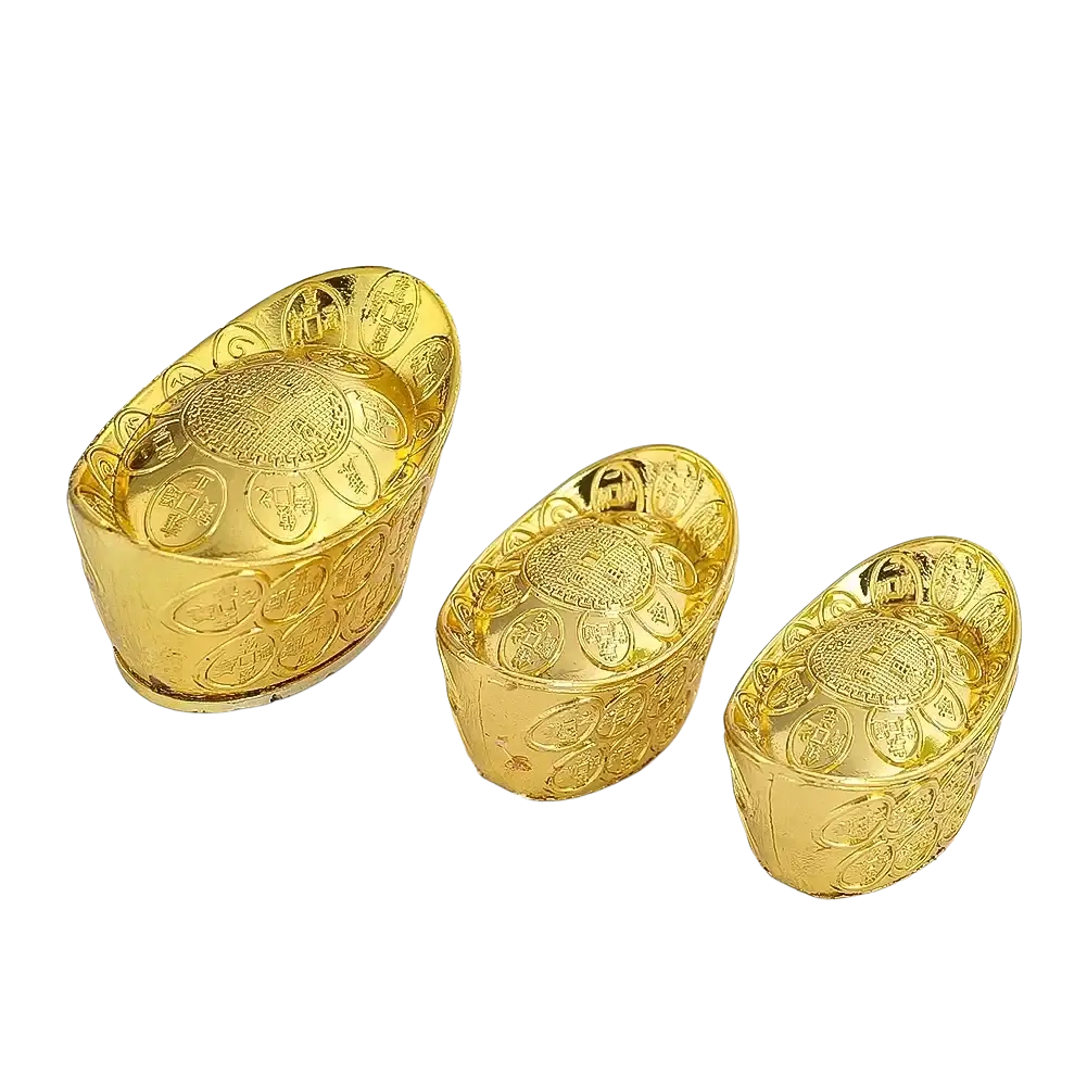 Golden intricately engraved feng shui gold ingot tabletop decor made of metal for fortune and prosperity enhancement