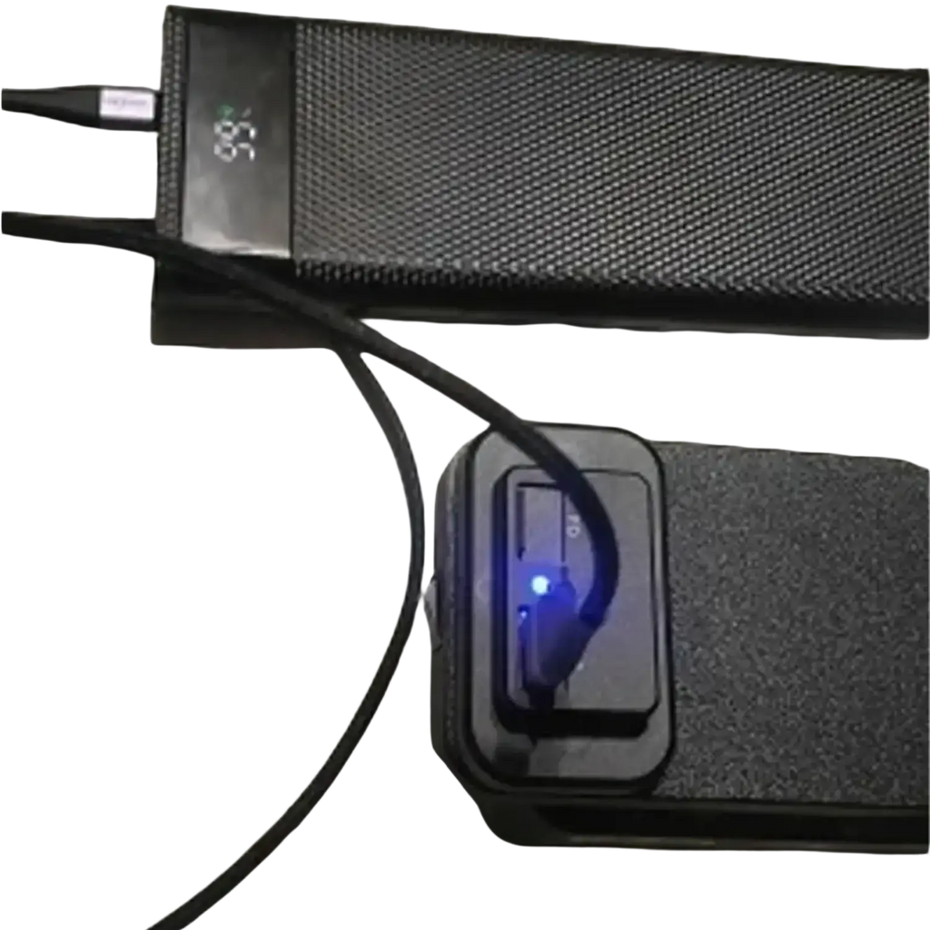 Black textured ferrex 20v power bank with digital display and usb port emitting blue light for fast charging