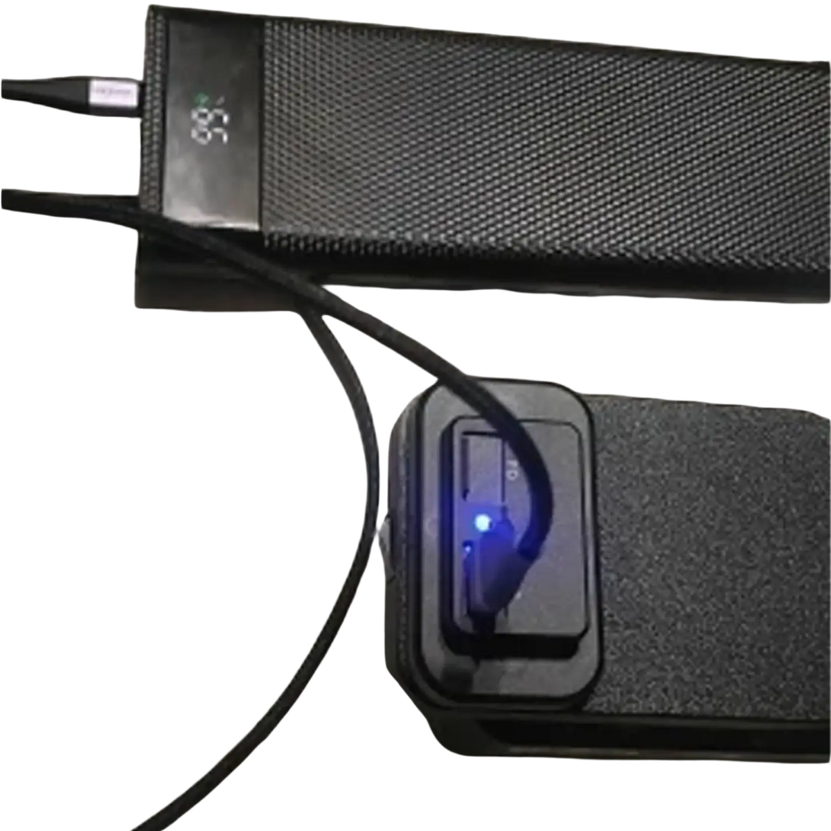 Black textured ferrex 20v power bank fast charging usb adapter with digital display showing 85 percent charge and blue led light