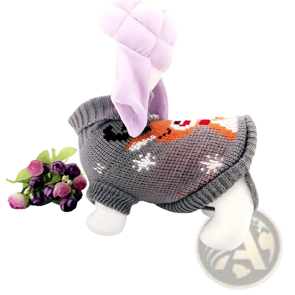Festive knit pet sweater with gray knitted fabric, orange fox and white snowflake design, and plush lavender hood