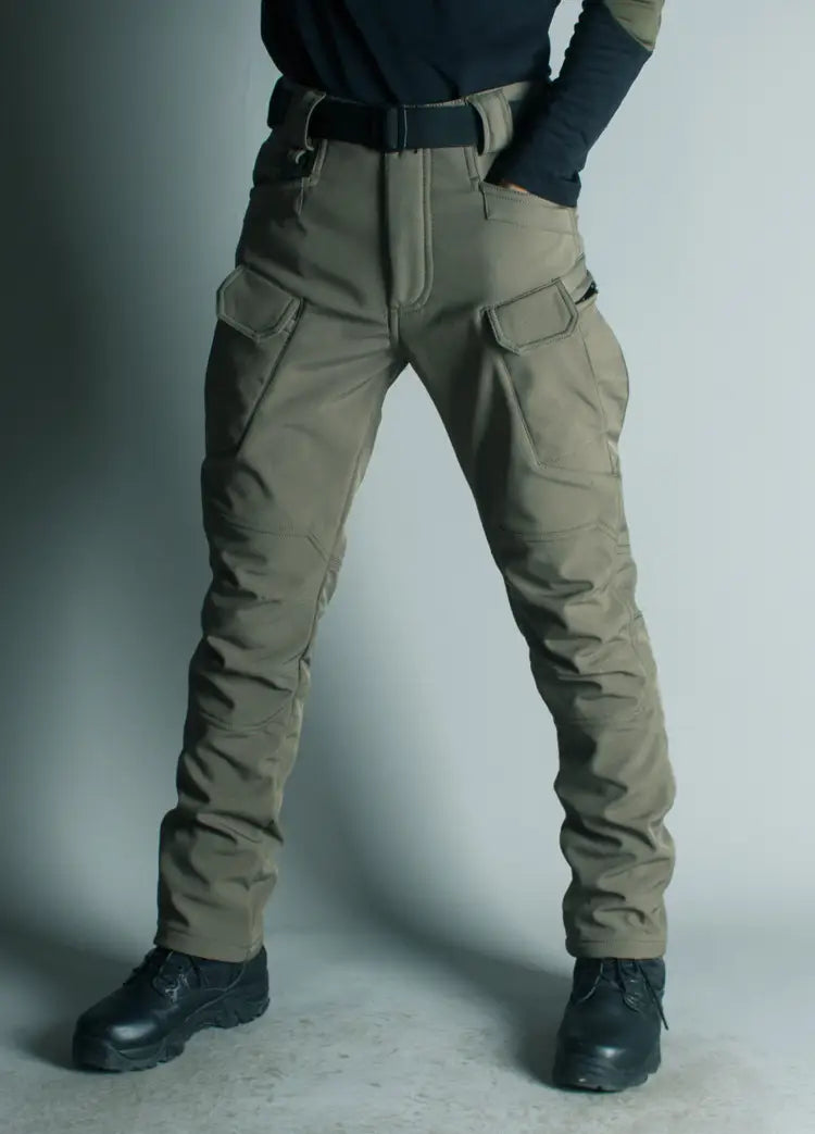 Ix7 mens khaki fleece lined tactical cargo pants featuring multiple sturdy pockets designed for work and outdoor use.