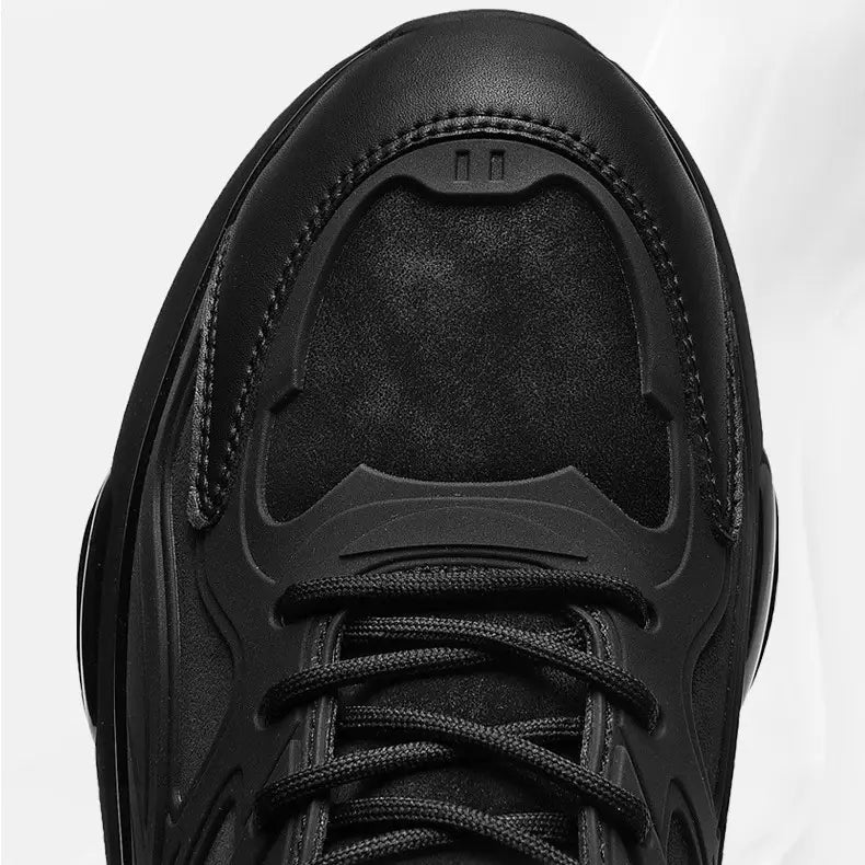 Black sneaker with a sleek all-black design featuring suede and synthetic overlays from the breathable mesh sneakers with gold accents collection.