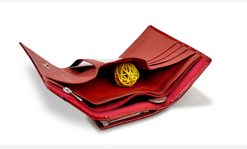 Retro crocodile pattern leather trifold wallet with clasp in red featuring a yellow woven ball nestled in the center compartment.