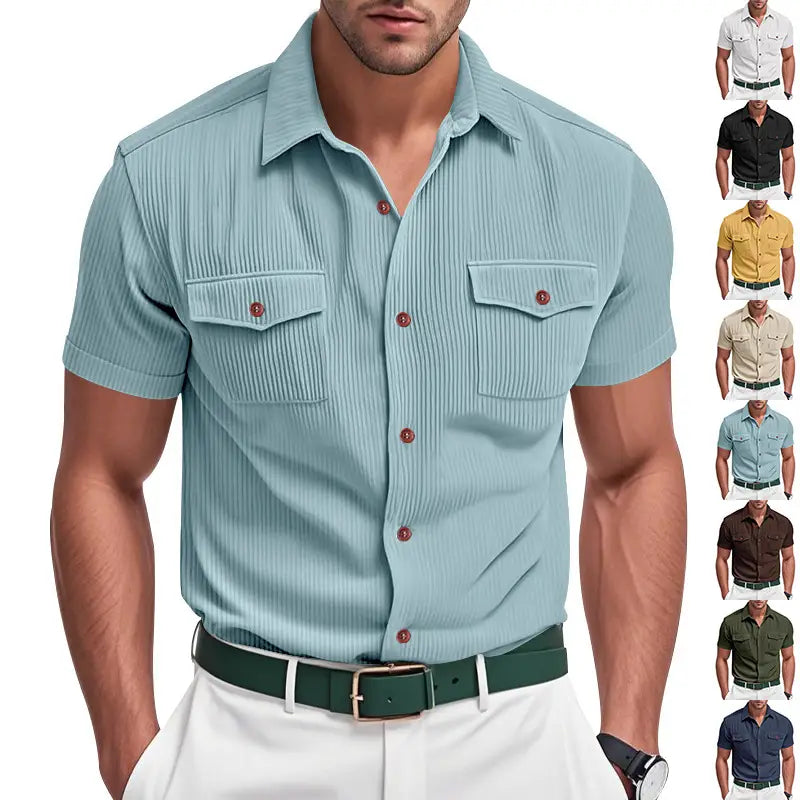 Light blue loose corduroy short sleeve workwear shirt with vertical ribbed texture and two chest pockets.