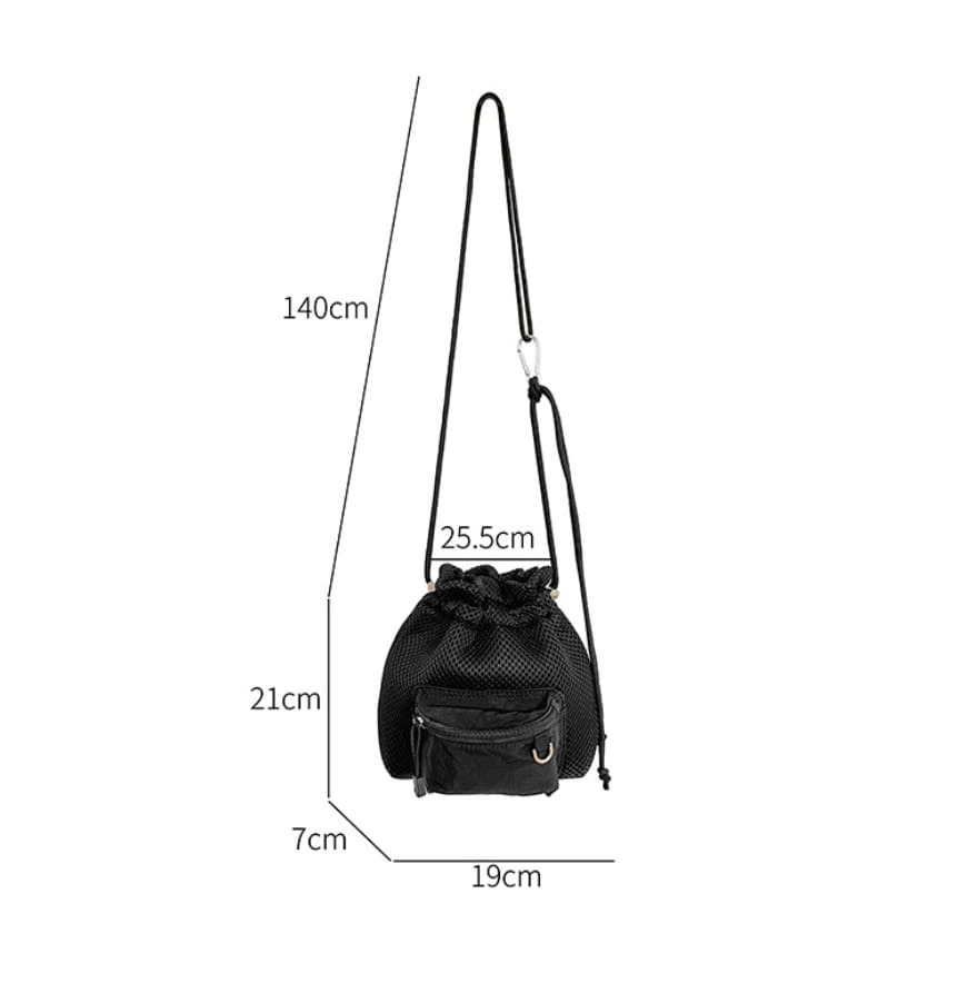 black mesh drawstring bucket bag with front zippered pocket and adjustable strap featuring a heart charm in mini pink mesh design