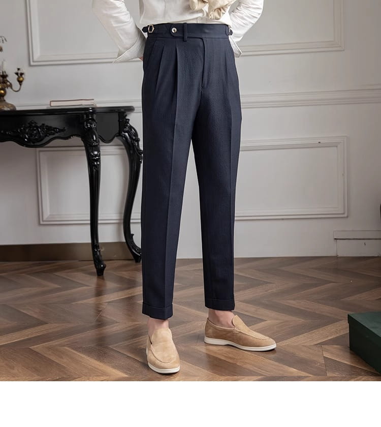 Dark navy slim fit pleated summer linen suit trousers with a tailored fit and buttoned waistband.