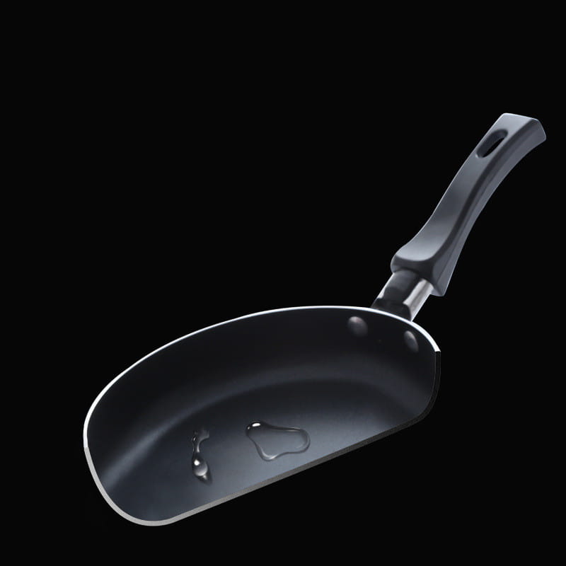 Black mini non-stick frying pan with a gray ergonomic handle made of aluminum cookware for easy cooking.