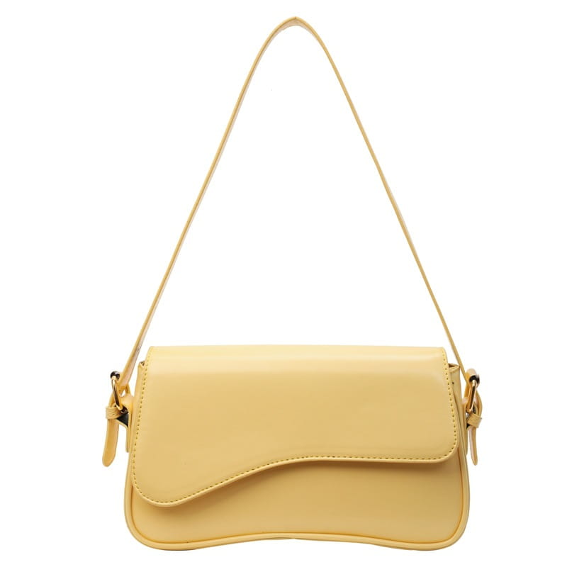 A sleek pale yellow leather messenger bag with a smooth glossy finish and minimalist crossbody design.