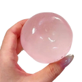 A translucent pink gel fidget toy ball made of tpr material with coconut oil for stress relief and sensory play
