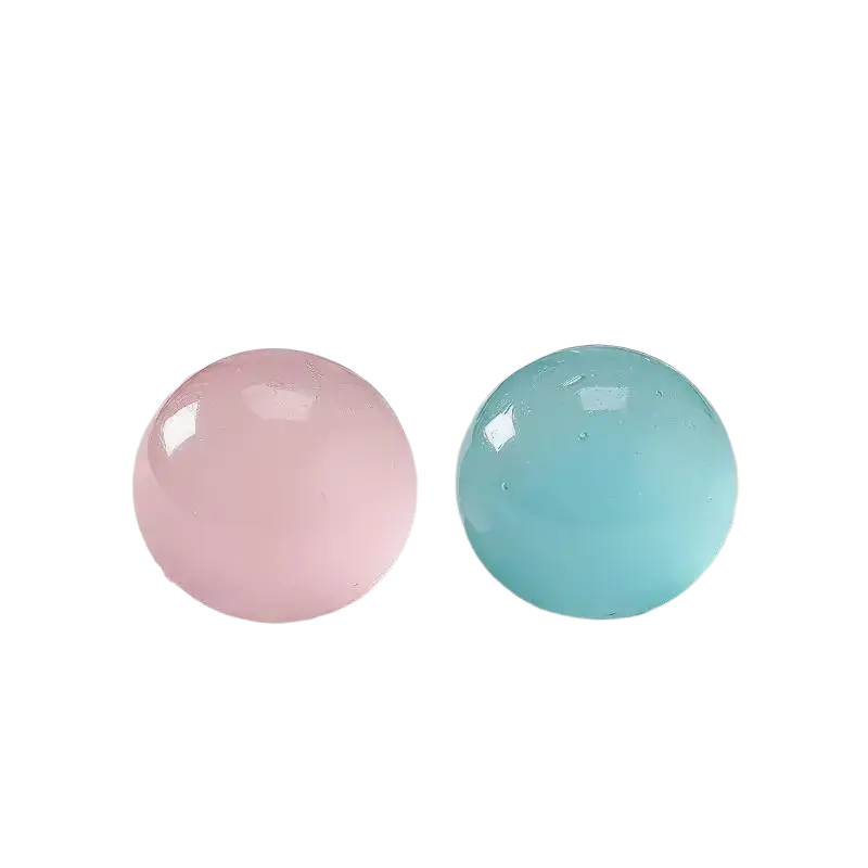 Two translucent fidget toy spheres in soft pink and light blue made of tpr material with coconut oil for stress relief