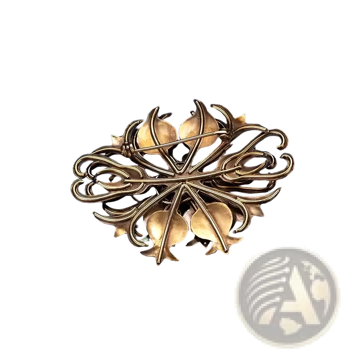 Antique brass-colored filigree brooch with intricate leaf and vine design from turquoise floral palace jewelry collection