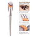 Silver smudge finger belly makeup brush with soft dense bristles and sleek aluminum handle for professional contouring