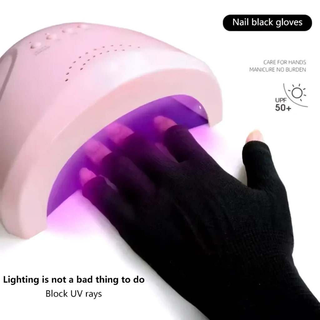 Pink uv nail lamp emitting purple light with a hand wearing black fingerless knit gloves unisex athletic wrist support