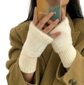 White fuzzy fingerless winter gloves for women with ribbed knit cuffs designed for warmth and style