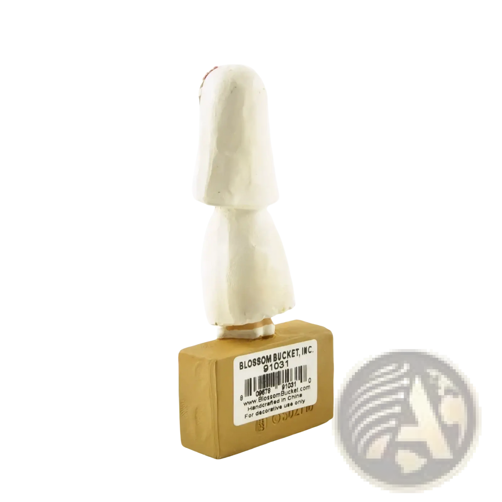 White carved wooden figurine of a long-haired girl standing on a rectangular base for first communion decor
