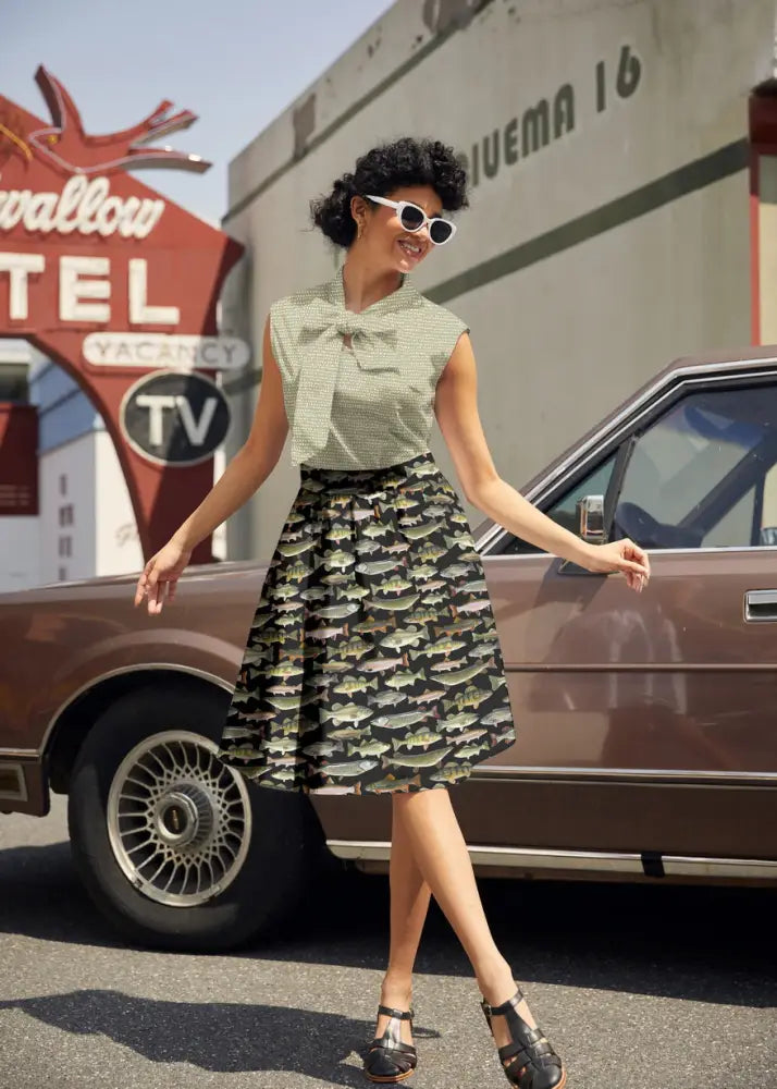 Vintage fish print cotton a-line skirt in green and black with a flared hem and pockets