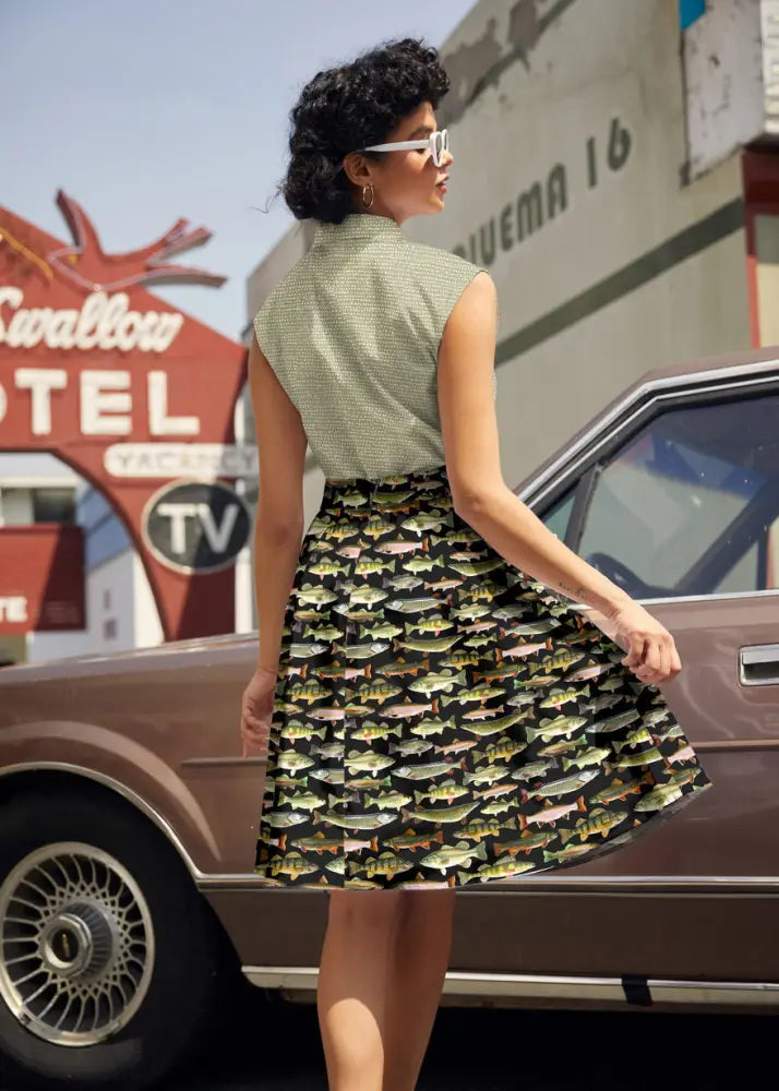 Vintage fish print cotton a-line skirt in black with green brown and beige fish pattern and pockets