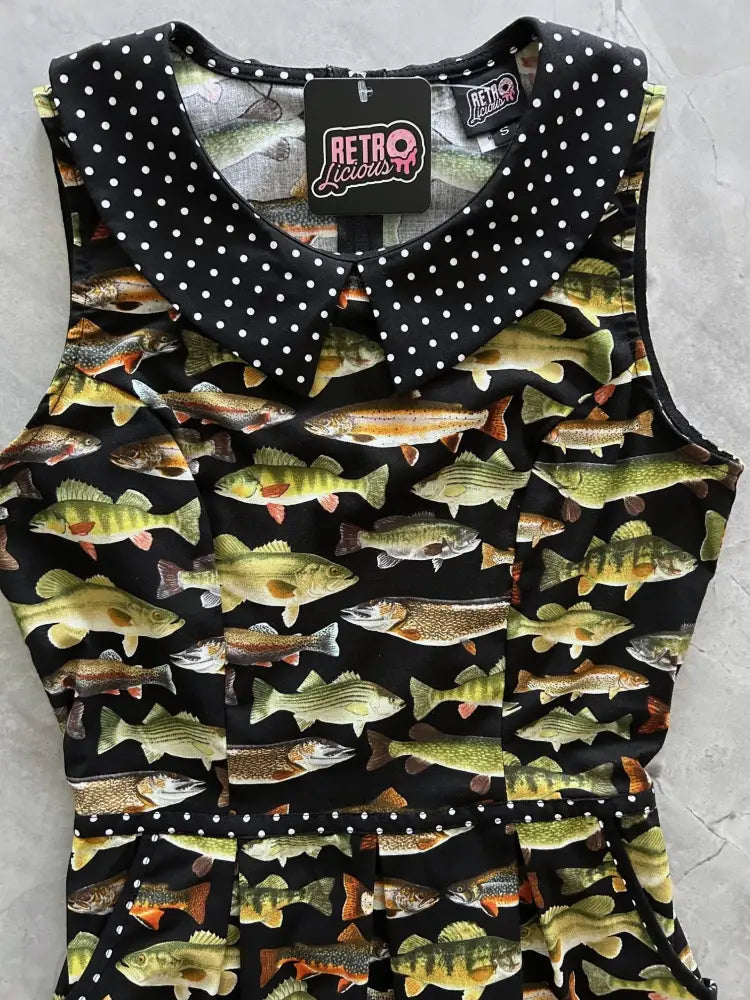 Black sleeveless retro dress with polka dot collar and green yellow freshwater fish print design