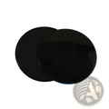 Two overlapping black circular glass fitness core sliders with a glossy finish for abdominal training