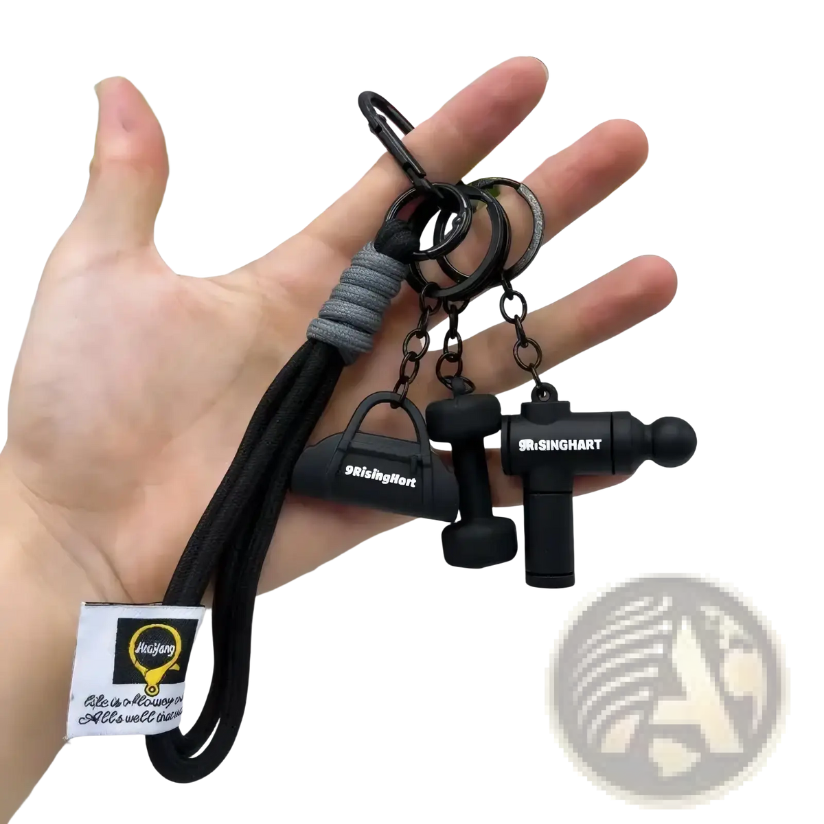 Black silicone fitness dumbbell keychain with miniature gym equipment charms, gray braided cord, and metal rings