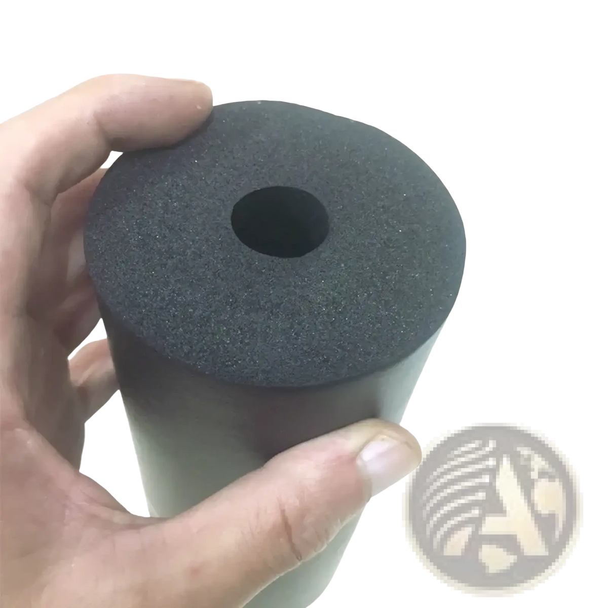 Black cylindrical foam insulation pipe with central hole used as a fitness equipment foam replacement pad for exercise benches
