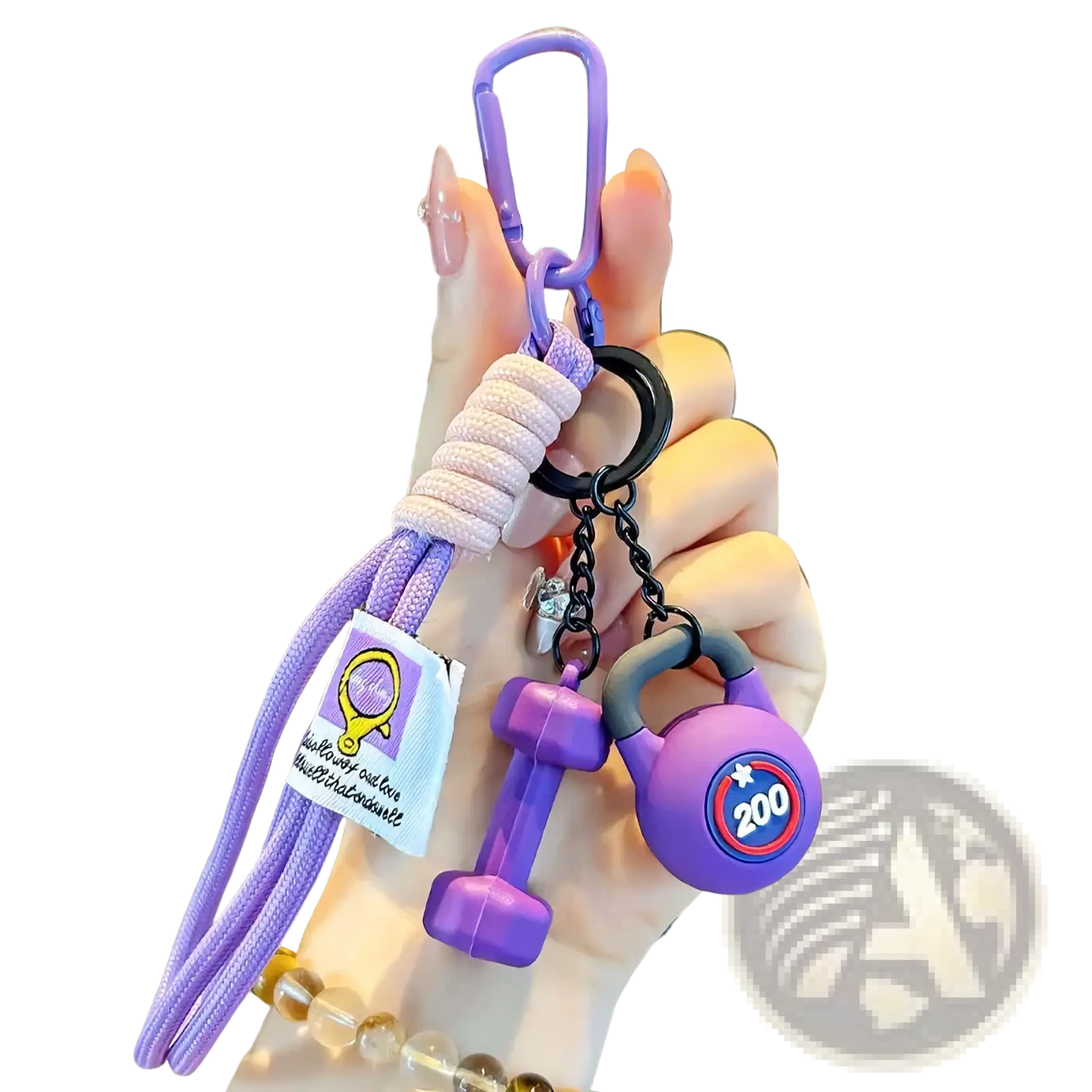 Purple silicone dumbbell and kettlebell fitness keychain with braided cord attachment for gym bag charm
