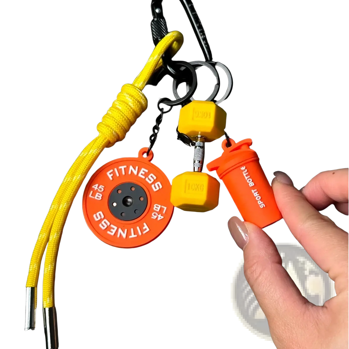 Orange silicone fitness keychain featuring a 45 lb weight plate yellow dumbbell and orange shaker bottle charms