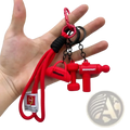 Red silicone fitness keychain with black braided cord and three gym bag themed charms including handbag dumbbell and usb drive