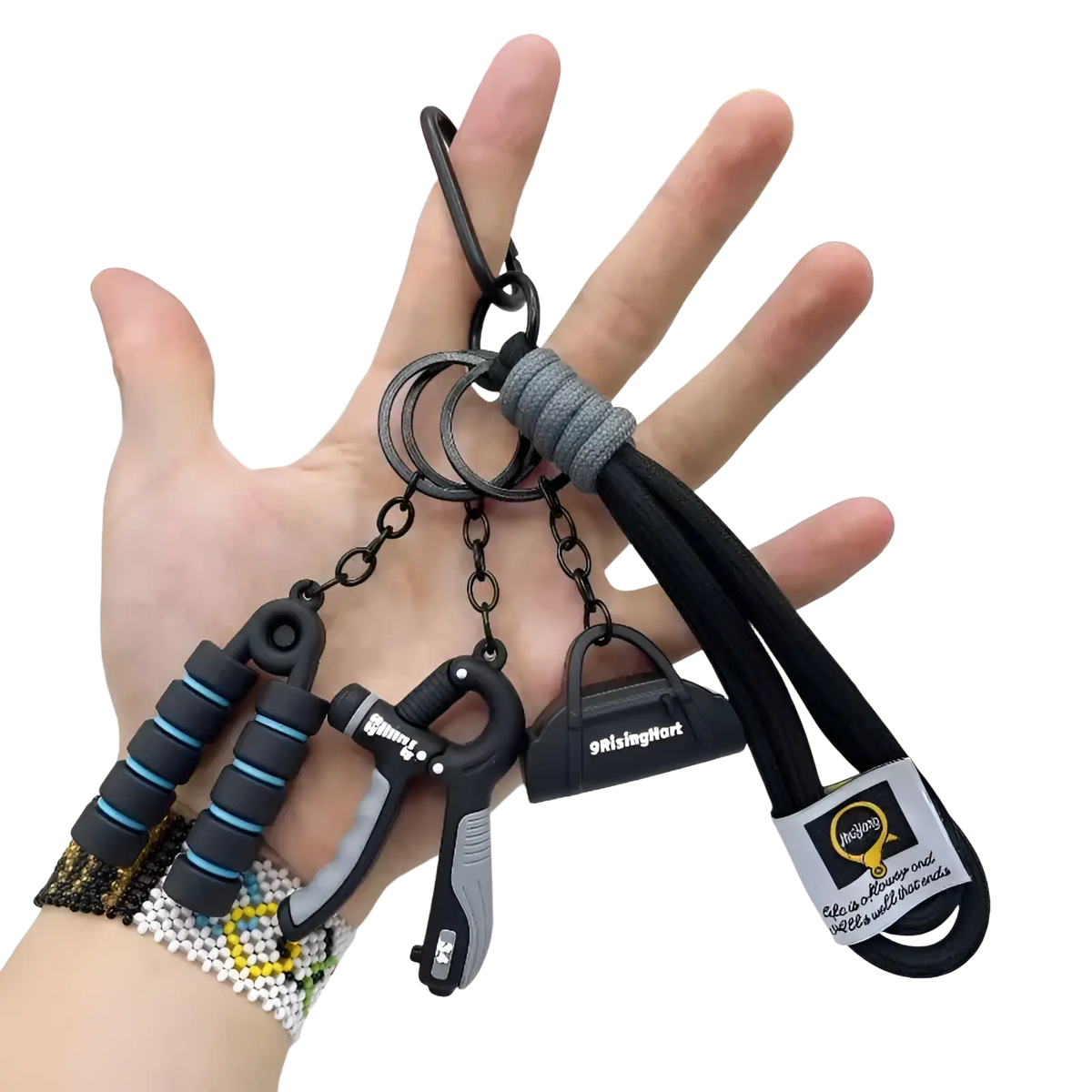 Black and gray fitness keychain set with hand grip, carabiner clip, and mini gym equipment bag pendant