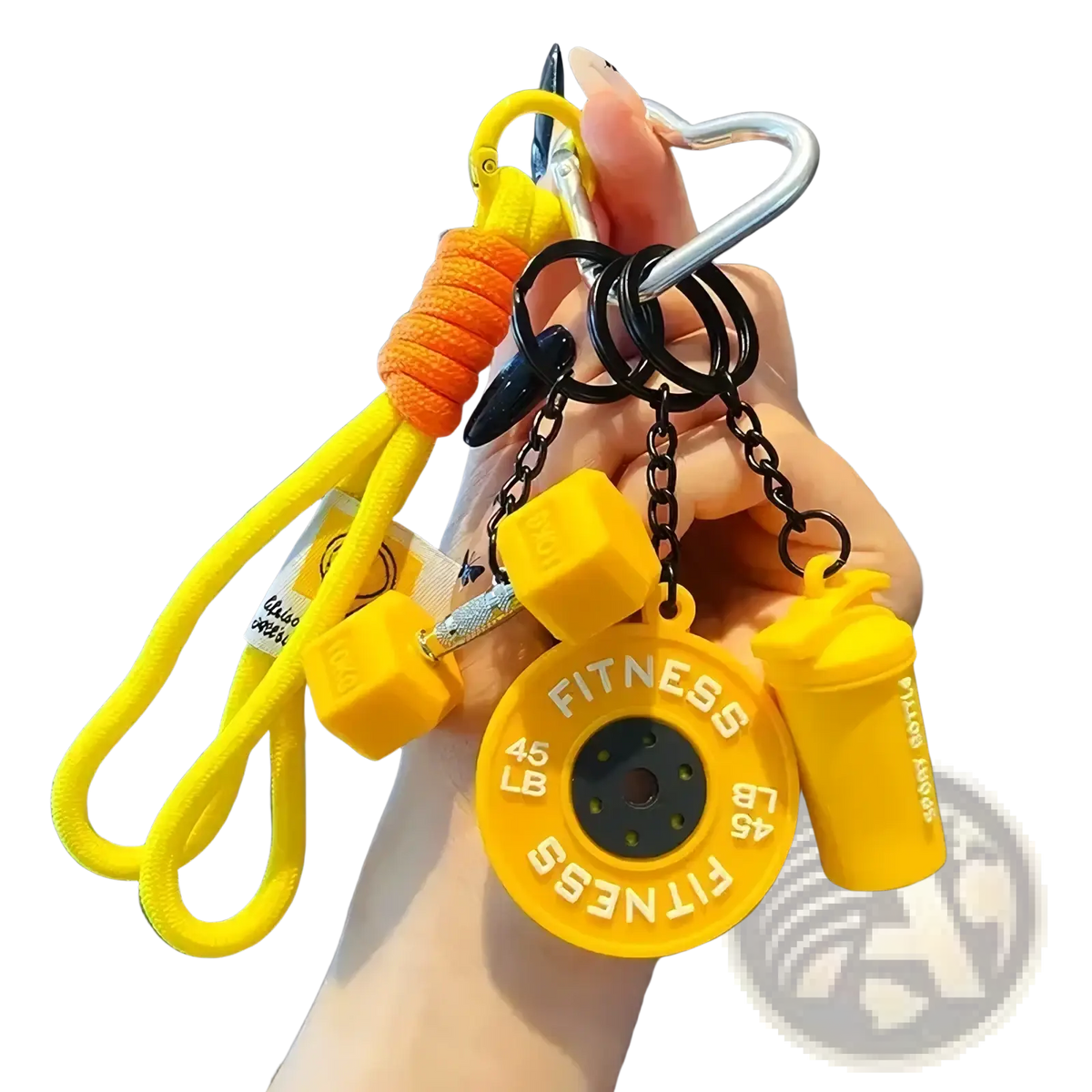 Bright yellow fitness keychain with circular weight plate, dumbbell charms, and water bottle charm for sports bags