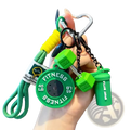 Green fitness keychain with circular weight plate, two hexagonal dumbbell charms, and small sport bottle charm